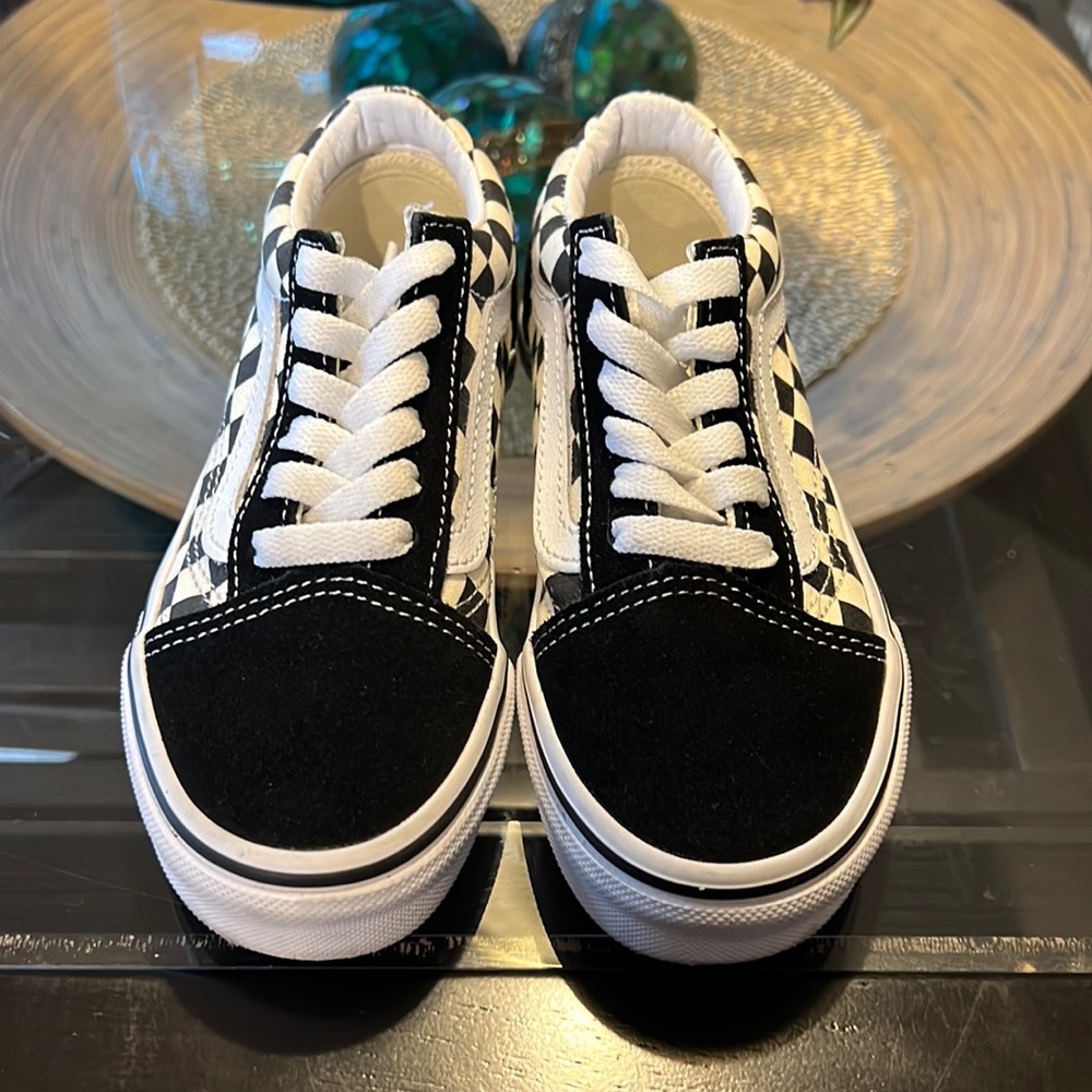 Boys size 13 black and white in color Vans